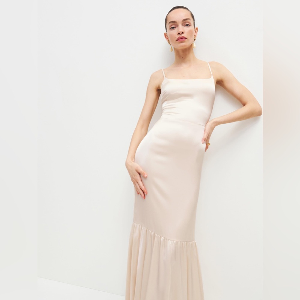 NWT Nasha dress from reformation in the color champaign.